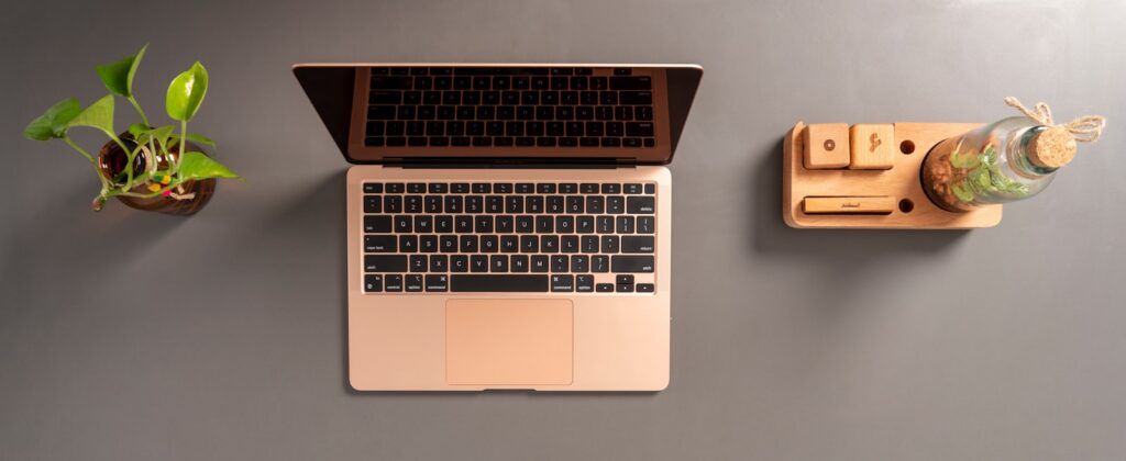 A clean minimal laptop workspace on a desk