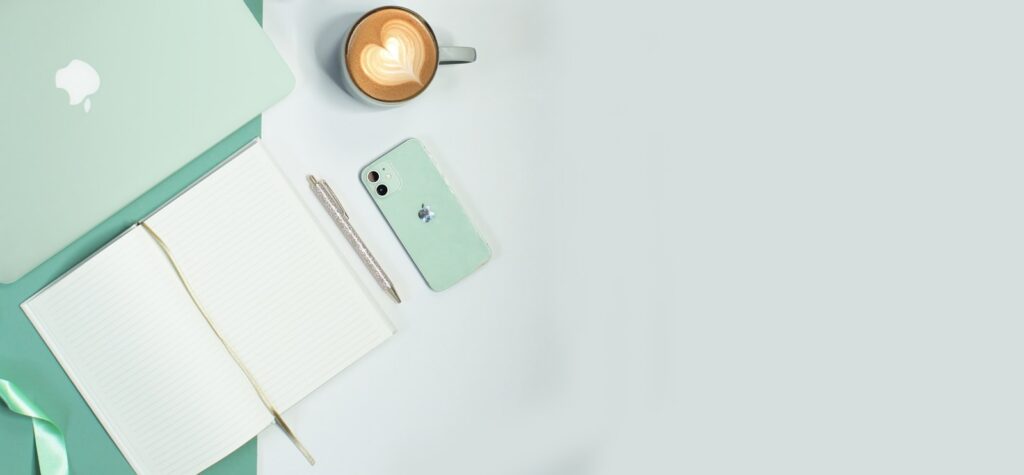 A desk laid out with marketing planning materials